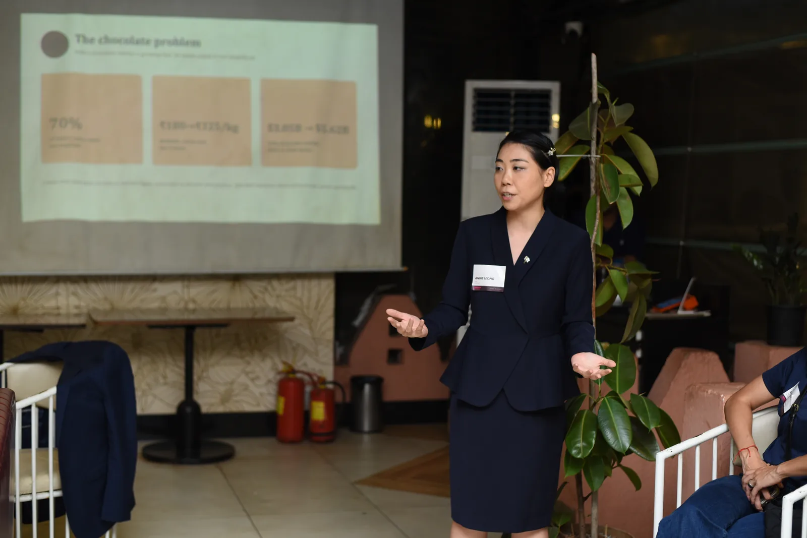 Angie Leong of Prefer presenting The chocolate problem at the FoodTech Weekly Roadshow in Mumbai